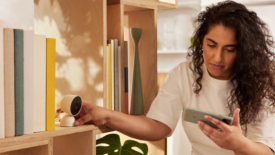 Women setting up Google Nest